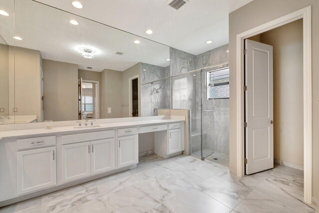 11535 SW Surf Springs Rd, Port Saint Lucie, FL 34987 - bathroom with a shower stall, recessed lighting, marble look tile flooring, and double vanity