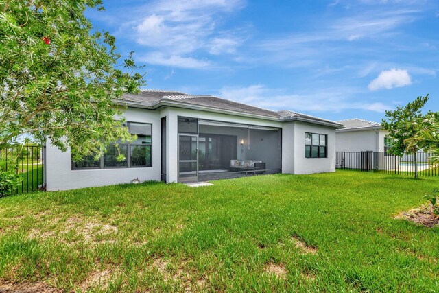 11535 SW Surf Springs Rd, Port Saint Lucie, FL 34987 - sunroom featuring ceiling fan and outdoor lounge area