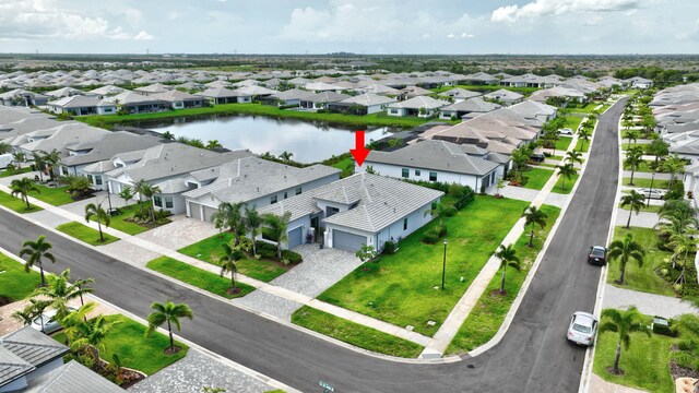 11535 SW Surf Springs Rd, Port Saint Lucie, FL 34987 - aerial view of residential area with a nearby body of water