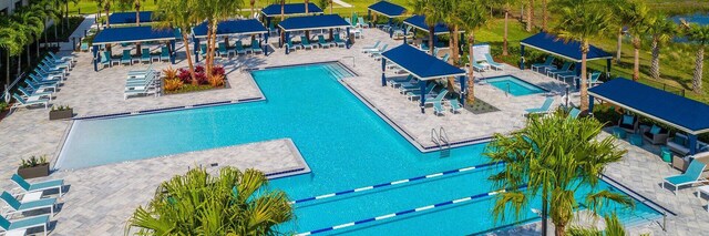 11535 SW Surf Springs Rd, Port Saint Lucie, FL 34987 - workout area featuring carpet flooring