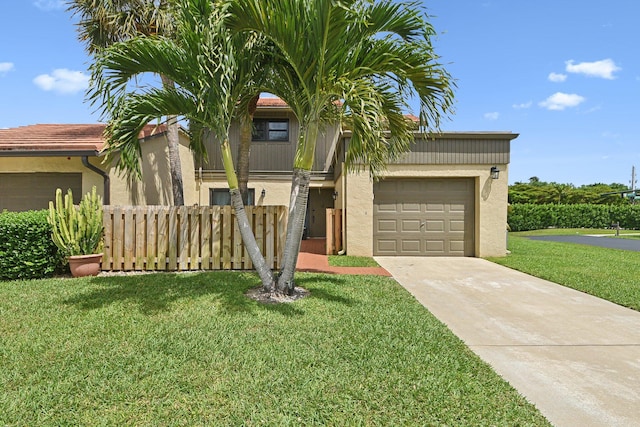 11063 Oakdale Rd, Boynton Beach, FL 33437 - view of front facade featuring an attached garage, concrete driveway, and stucco siding