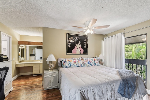 11063 Oakdale Rd, Boynton Beach, FL 33437 - bedroom with multiple windows, dark wood-type flooring, a textured ceiling, connected bathroom, and ceiling fan