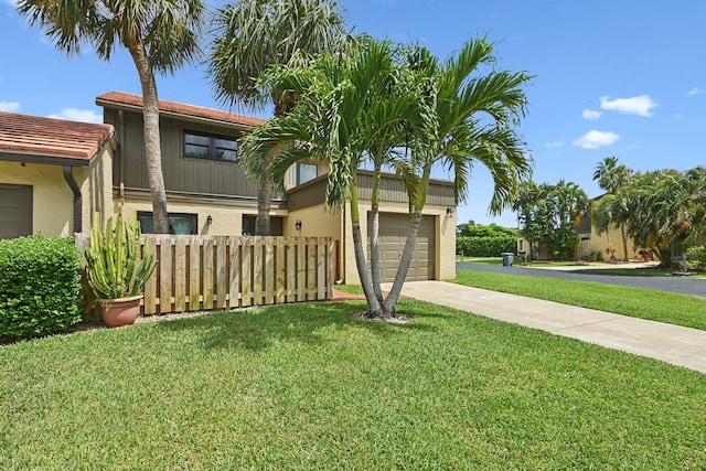 11063 Oakdale Rd, Boynton Beach, FL 33437 - view of front facade featuring driveway and stucco siding