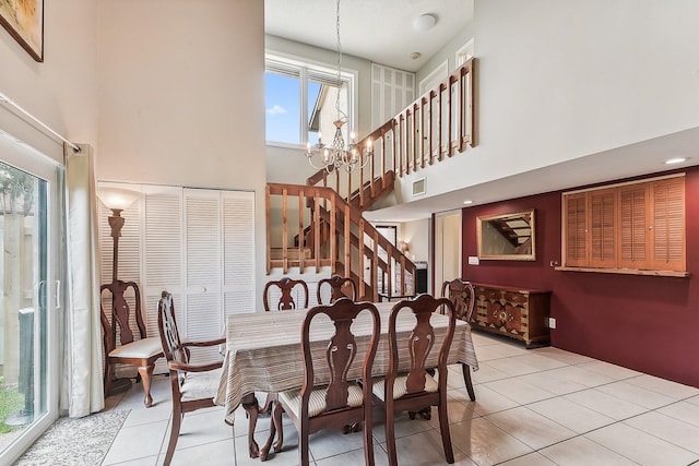 11063 Oakdale Rd, Boynton Beach, FL 33437 - dining area with a high ceiling, stairway, healthy amount of natural light, and tile patterned floors