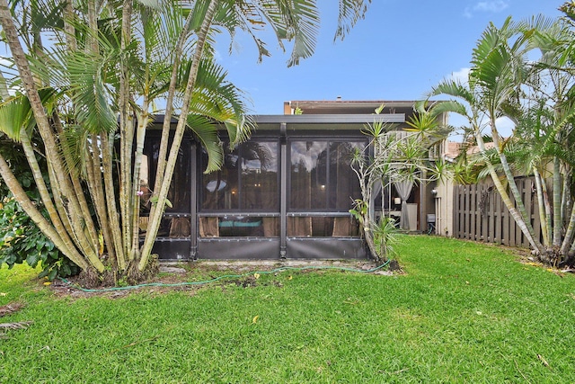 11063 Oakdale Rd, Boynton Beach, FL 33437 - rear view of house with a sunroom