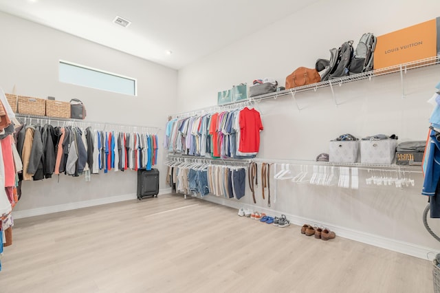 3153 SW Pond Apple St, Palm City, FL 34990 - spacious closet with wood finished floors