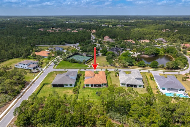 3153 SW Pond Apple St, Palm City, FL 34990 - aerial overview of property's location with a heavily wooded area and nearby suburban area