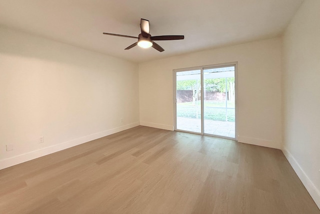 216 SE Fallon Dr, Port Saint Lucie, FL 34983 - spare room featuring wood finished floors and ceiling fan