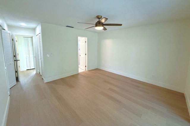 216 SE Fallon Dr, Port Saint Lucie, FL 34983 - unfurnished room featuring a ceiling fan and light wood-style flooring