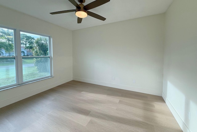 216 SE Fallon Dr, Port Saint Lucie, FL 34983 - empty room featuring light wood finished floors and ceiling fan