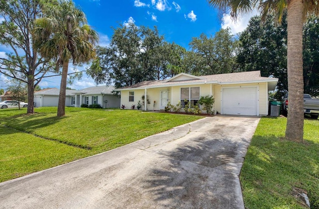 1967 SW Ember St, Port Saint Lucie, FL 34953 - single story home with a garage, driveway, and a front lawn