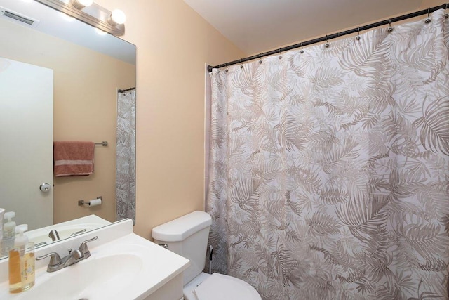 1967 SW Ember St, Port Saint Lucie, FL 34953 - full bathroom with toilet and vanity