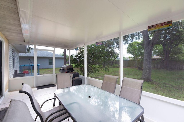 1967 SW Ember St, Port Saint Lucie, FL 34953 - sunroom featuring outdoor dining area