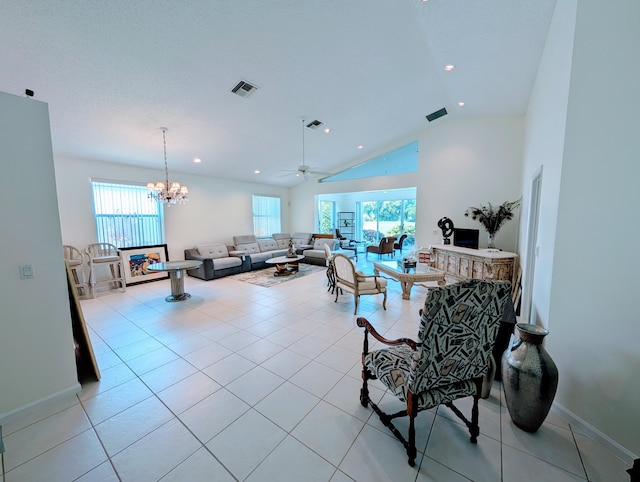 11857 Fountainside Cir, Boynton Beach, FL 33437 - living area with a chandelier, lofted ceiling, light tile patterned floors, a ceiling fan, and recessed lighting