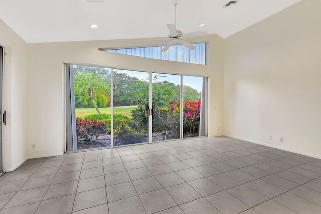 11857 Fountainside Cir, Boynton Beach, FL 33437 - unfurnished room featuring ceiling fan, plenty of natural light, light tile patterned floors, and high vaulted ceiling