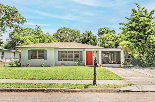 1606 16th Ave N, Lake Worth Beach, FL 33460 - view of front facade featuring driveway and stucco siding