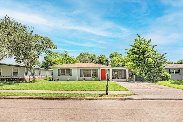 1606 16th Ave N, Lake Worth Beach, FL 33460 - ranch-style house with concrete driveway