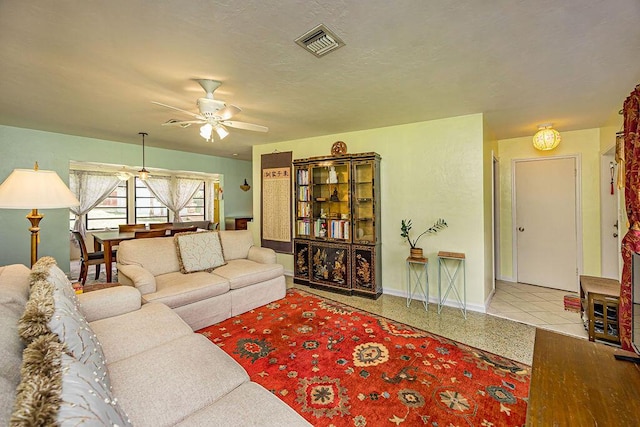 1606 16th Ave N, Lake Worth Beach, FL 33460 - living room featuring a ceiling fan and speckled floor