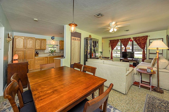 1606 16th Ave N, Lake Worth Beach, FL 33460 - dining area with ceiling fan and dark speckled floor