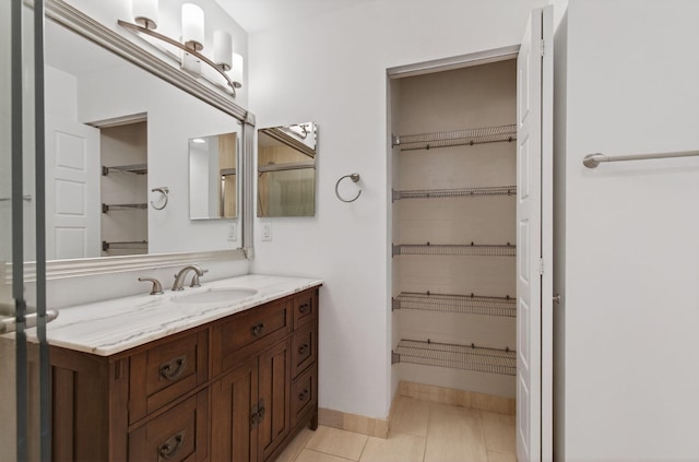 9850 Kamena Cir, Boynton Beach, FL 33436 - bathroom with vanity and tile patterned floors