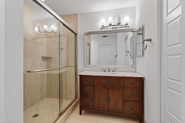 9850 Kamena Cir, Boynton Beach, FL 33436 - bathroom with a stall shower, vanity, and tile patterned flooring