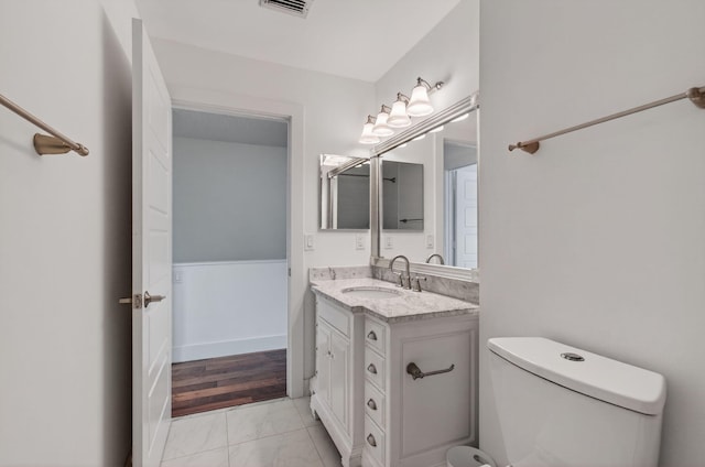 9850 Kamena Cir, Boynton Beach, FL 33436 - bathroom featuring marble look tile flooring and vanity