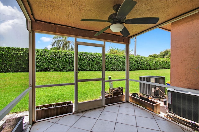 9850 Kamena Cir, Boynton Beach, FL 33436 - sunroom featuring a ceiling fan
