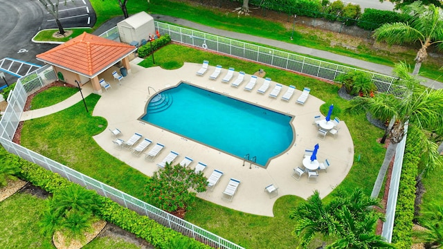 9850 Kamena Cir, Boynton Beach, FL 33436 - community pool featuring a fenced backyard and a patio