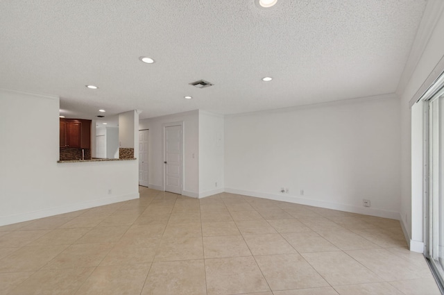 9850 Kamena Cir, Boynton Beach, FL 33436 - unfurnished room featuring a textured ceiling, recessed lighting, light tile patterned floors, and crown molding