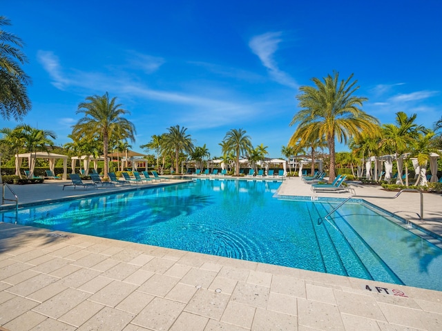 13058 Artisan Cir, Palm Beach Gardens, FL 33418 - community pool featuring a gazebo and a patio