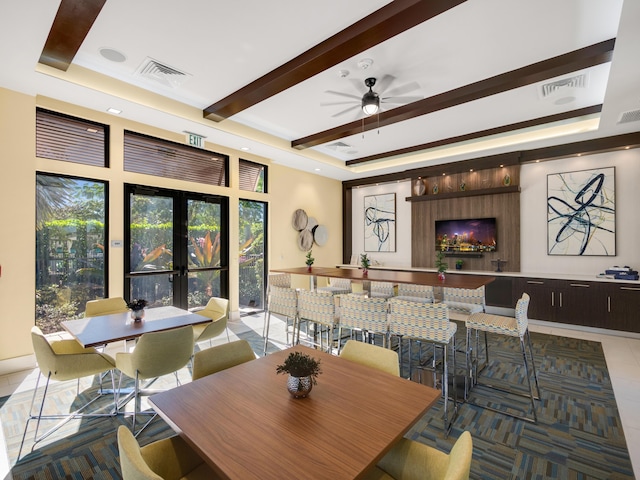 13058 Artisan Cir, Palm Beach Gardens, FL 33418 - tiled dining room featuring a raised ceiling, a ceiling fan, and beamed ceiling