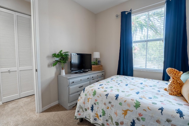 161 Lake Monterey Cir, Boynton Beach, FL 33426 - bedroom with light carpet and a closet