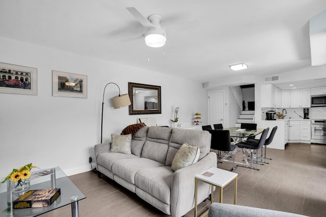 8291 Thames Blvd Unit C, Boca Raton, FL 33433 - living area featuring stairway and a ceiling fan