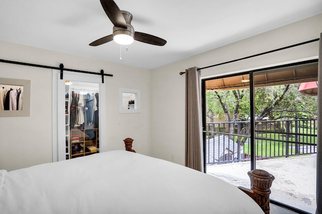 8291 Thames Blvd Unit C, Boca Raton, FL 33433 - bedroom with access to exterior, a barn door, a walk in closet, a ceiling fan, and a closet