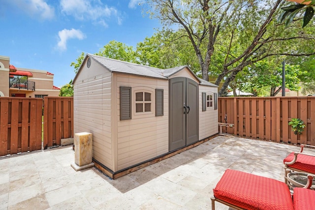 8291 Thames Blvd Unit C, Boca Raton, FL 33433 - view of shed featuring a fenced backyard