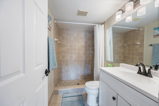 624 Sea Pine Way Unit A2, Greenacres, FL 33415 - bathroom with vanity, tiled shower, and tile patterned flooring