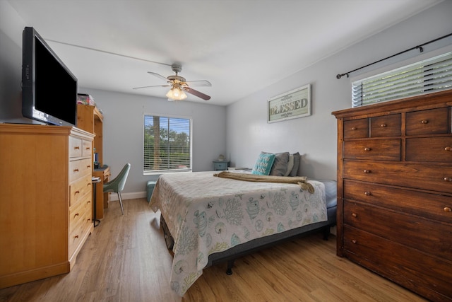624 Sea Pine Way Unit A2, Greenacres, FL 33415 - bedroom featuring light wood-style floors and a ceiling fan