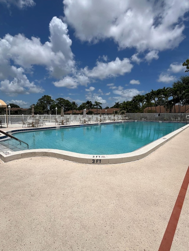624 Sea Pine Way Unit A2, Greenacres, FL 33415 - community pool featuring a patio