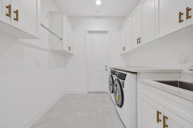 737 Nighthawk Way, North Palm Beach, FL 33408 - washroom with washer and clothes dryer, cabinet space, and recessed lighting