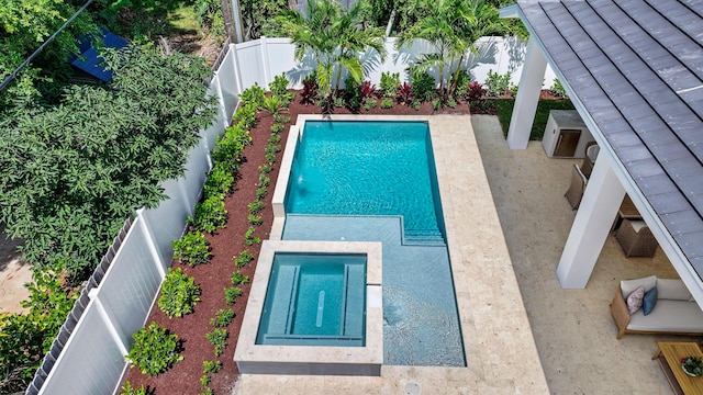 737 Nighthawk Way, North Palm Beach, FL 33408 - view of swimming pool with a fenced backyard