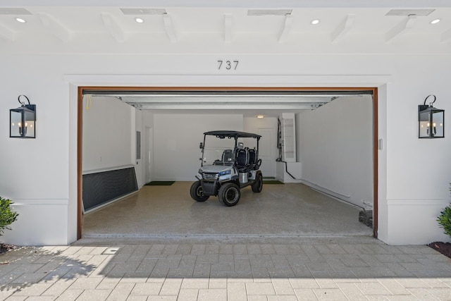 737 Nighthawk Way, North Palm Beach, FL 33408 - garage with driveway