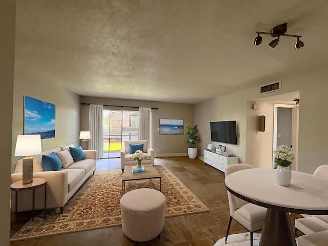 717 Gardens Dr Unit 106, Pompano Beach, FL 33069 - living area featuring baseboards