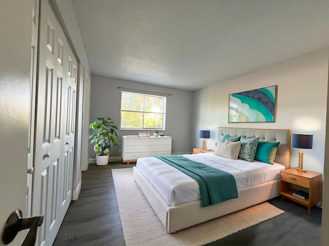 717 Gardens Dr Unit 106, Pompano Beach, FL 33069 - bedroom featuring wood finished floors and baseboards
