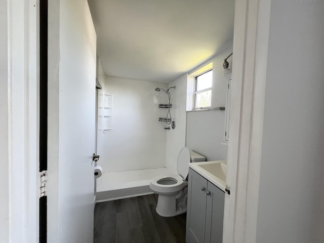 717 Gardens Dr Unit 106, Pompano Beach, FL 33069 - full bath with a stall shower, wood finished floors, and vanity