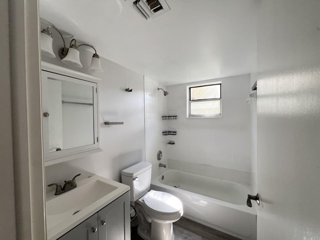 717 Gardens Dr Unit 106, Pompano Beach, FL 33069 - full bathroom featuring vanity, shower / bath combination, and wood finished floors