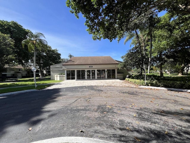 717 Gardens Dr Unit 106, Pompano Beach, FL 33069 - view of front of home with driveway