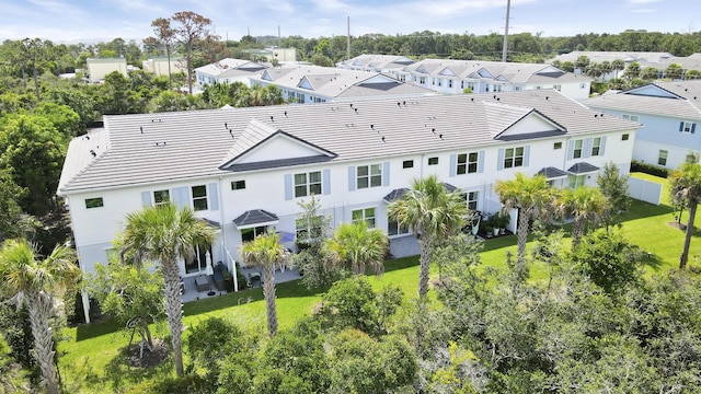 1416 Gopher Ter, Stuart, FL 34994 - rear view of property featuring a residential view and a tile roof