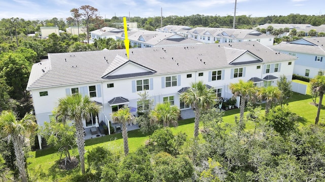 1416 Gopher Ter, Stuart, FL 34994 - rear view of property featuring a residential view and a tiled roof