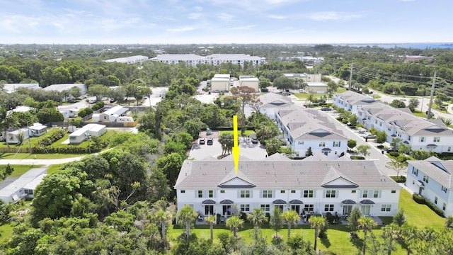 1416 Gopher Ter, Stuart, FL 34994 - aerial view of residential area featuring a tree filled landscape