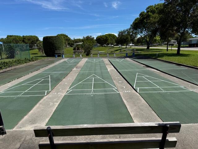 7376 W Oakridge Cir Unit C4320, Lake Worth, FL 33462 - surrounding community with shuffleboard